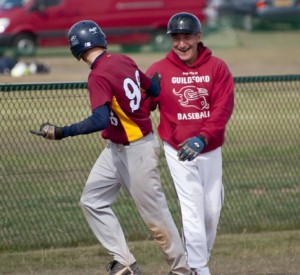 Coach Tony Oliva sends Pawel to home plate